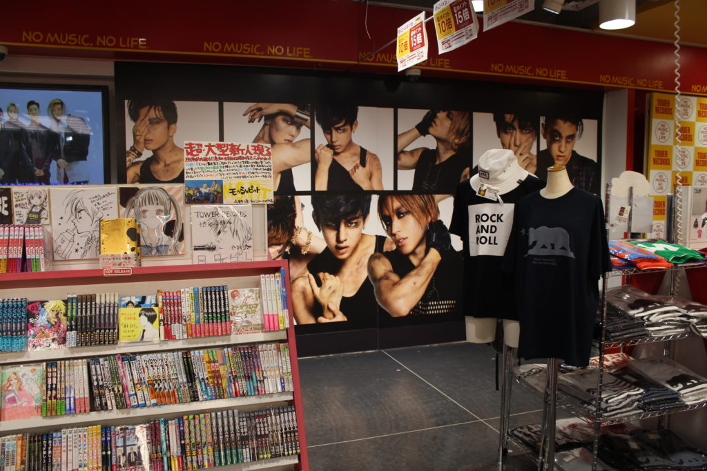 Shirts, hats, and other music merch available on the first floor of Tower Records Shibuya
